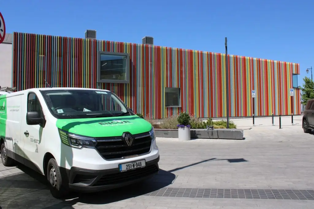 ENCON van outside a building with a timber-clad facade