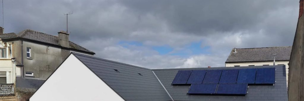 Solar panels installed on a slate roof